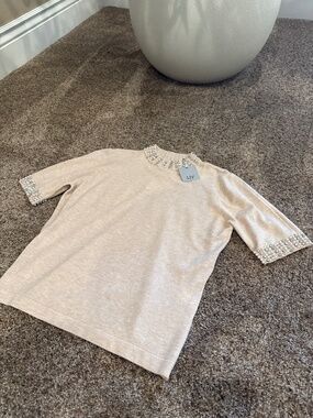 Rhinestone and pearl accent top